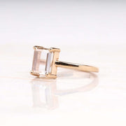 Side view of radiant diamond ring in four-prong setting