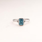 Emerald Cut Blue Sapphire Solitaire Bezel Ring