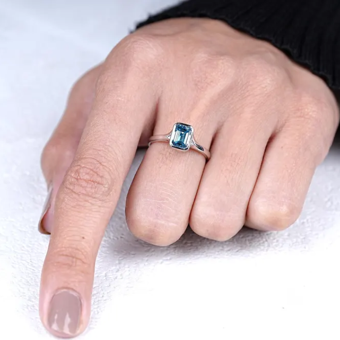 Emerald Cut Blue Sapphire Solitaire Bezel Ring