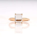 Load image into Gallery viewer, Radiant diamond ring with four-prong setting on a white background
