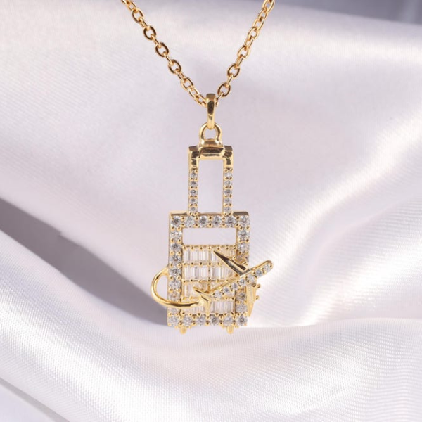 Crystal-Studded Travel Charm Pendant – Airplane & Suitcase Design