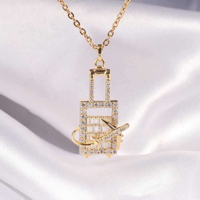 Crystal-Studded Travel Charm Pendant – Airplane & Suitcase Design