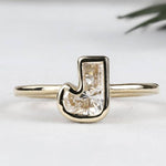 J initial ring
