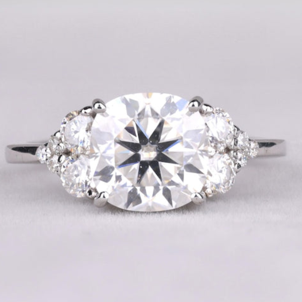Cushion Cut Diamond Ring with Side Accents in Silver