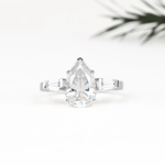 Pear Shaped Moissanite Three Stone Engagement Ring - Minimal Carbon