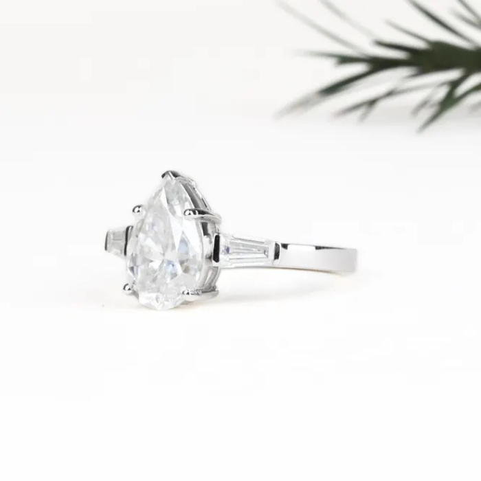 Pear Shaped Moissanite Three Stone Engagement Ring - Minimal Carbon