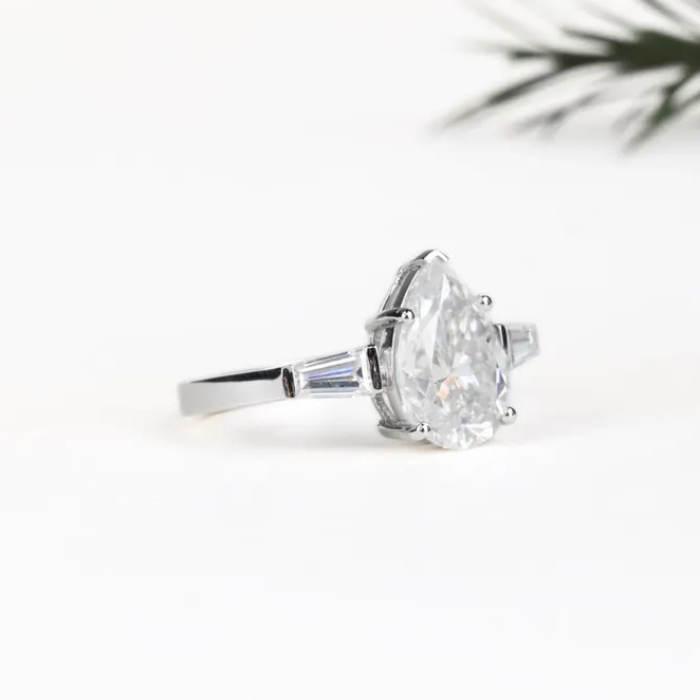 Pear Shaped Moissanite Three Stone Engagement Ring - Minimal Carbon