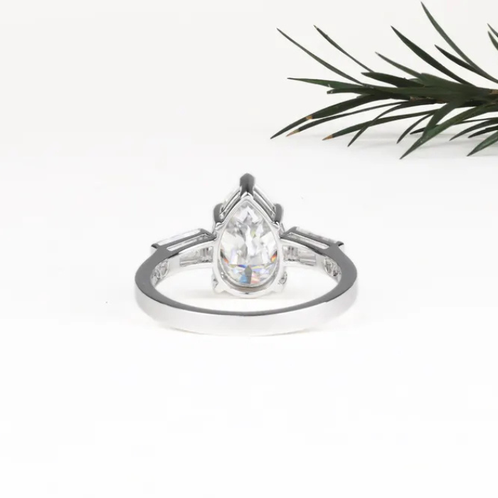 Pear Shaped Moissanite Three Stone Engagement Ring - Minimal Carbon