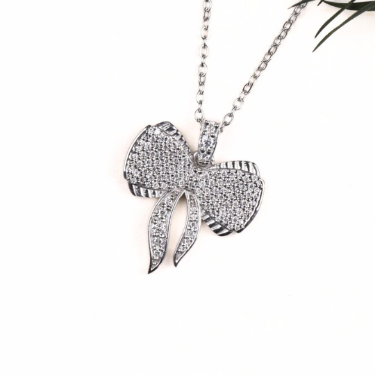 moissanite diamond pendant round cut bow shape