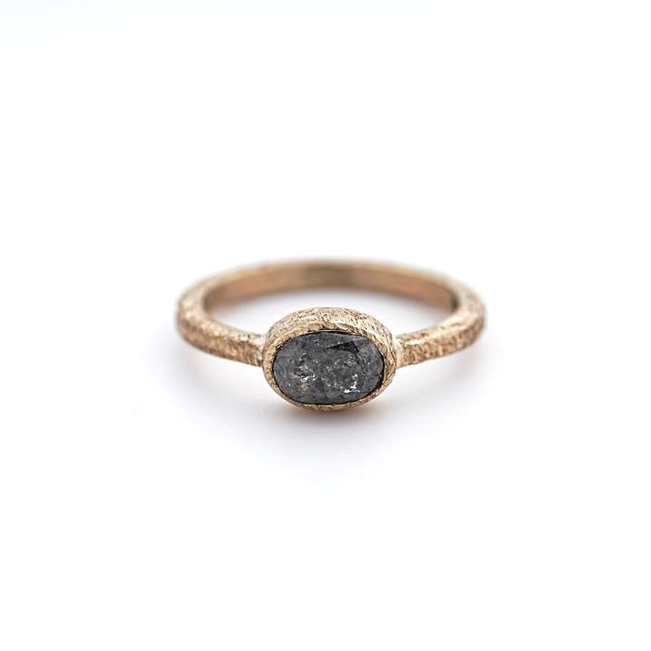 Oval cut salt and pepper diamond 