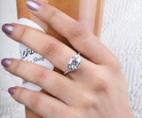 Cushion Cut Diamond Ring with Side Accents in Silver