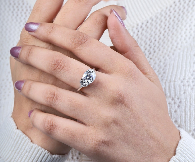 Cushion Cut Diamond Ring with Side Accents in Silver