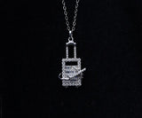 Crystal-Studded Travel Charm Pendant – Airplane & Suitcase Design