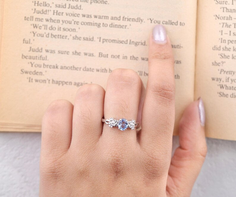 Blue Oval Gemstone Ring with Floral Diamond Accents