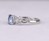 Blue Oval Gemstone Ring with Floral Diamond Accents