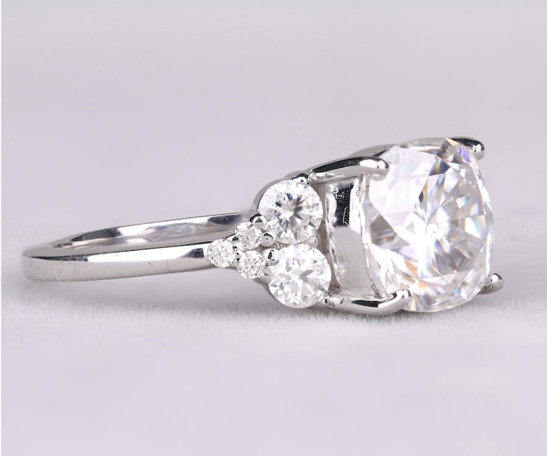 Cushion Cut Diamond Ring with Side Accents in Silver