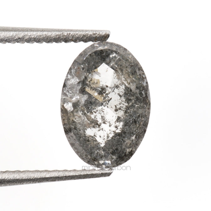 0.84 CT, 6.7 X 4.8 MM | Salt And Pepper Oval Cut Diamond - Minimal Carbon