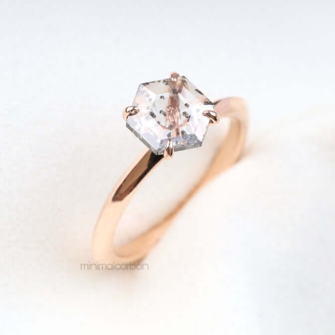 Elegant engagement ring in four prong setting – silver band with diamond